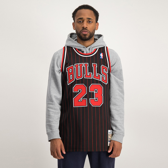 basketball jersey over hoodie outfit