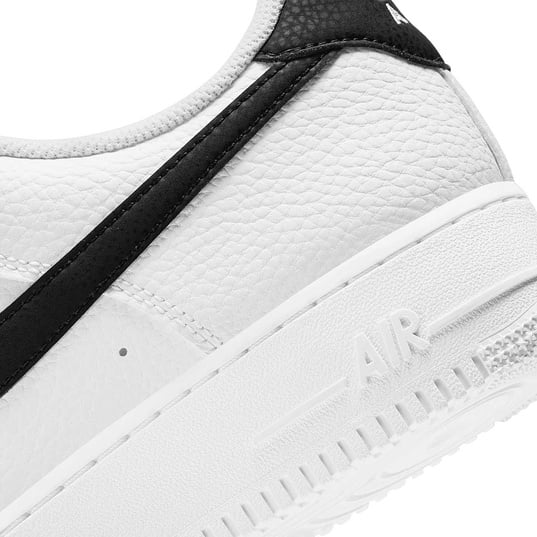 🏀 Get the Nike Air Force 1 07 sneaker in white with a black swoosh | KICKZ