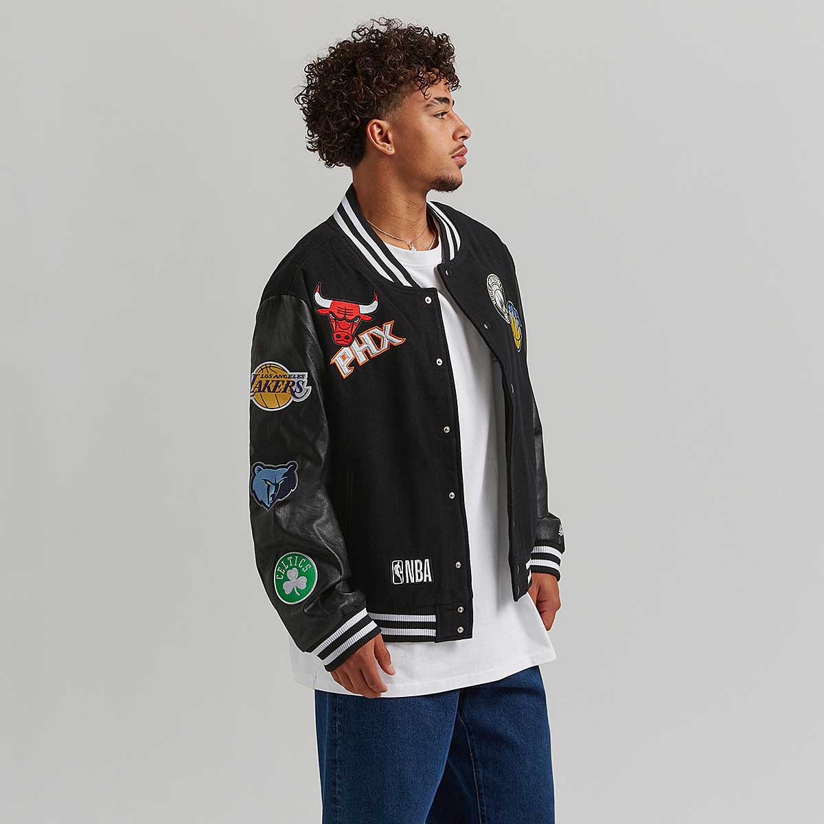 Image of New Era NBA All Over Logos Varsity Jacket, Black